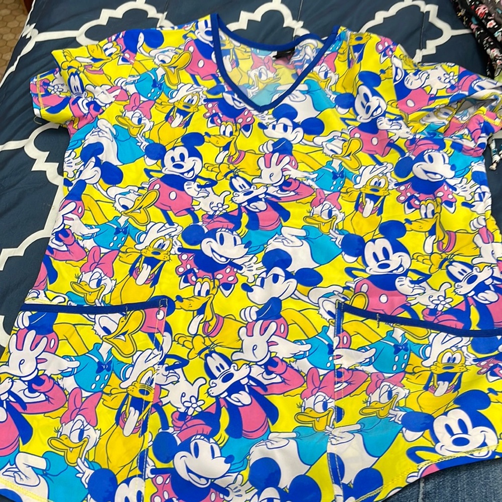 Gently used Disney scrub top size M
